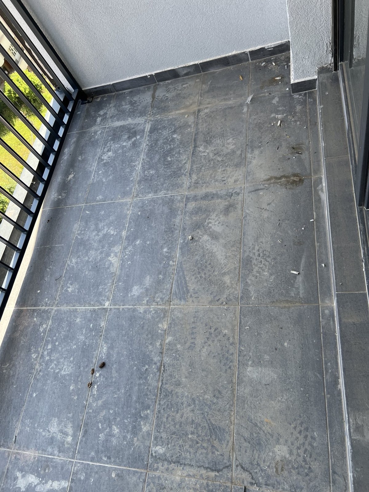 Balcony area before cleaning by Clean Star NY Inc