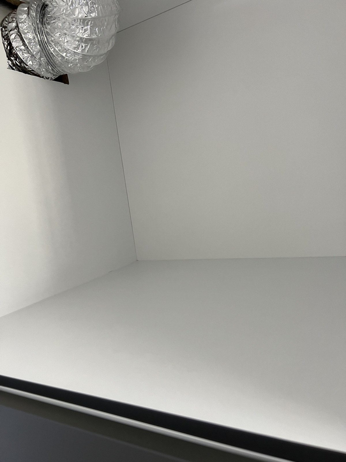 Shelf area after dust and debris removal